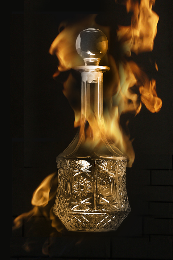 Product Photography: perfume bottle with flame, from the ZIBADIS photography archive